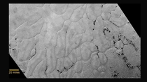 Closeup of Plutos heart Craterless terrain is carbon monoxide 