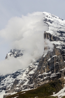 Clouds clinging to the mile-high north face of the Eiger - Kleine Scheidegg Switzerland 