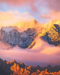 Clouds floating around Mt Whitney CA at sunrise    