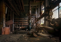 cogs and wheels and pipes and random abandoned stuff in this coke plant Belgium 