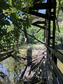 Collapsed train bridge with hole in the middle