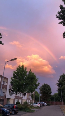 Colored sky and a rainbow in the Netherlands
