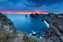 Colorful sunset at a cliff at Canial Madeira Island Madrid Portugal by Miguel Nbrega