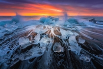 Crashing waves lots of ice and a crazy epic sunrise at the Diamond beach in Iceland OC