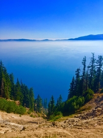 Crater Lake Oregon with a layer of smoke from a nearby Bushfire 