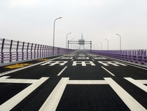 Crossing the Hangzhou Bay Bridge China by Rainer Ganahl 