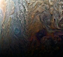 Dark spot on Jupiter seems to reveal a Jovian galaxy of swirling storms 