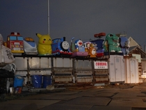 Decommissioned kids rides on a scrapyard Japan 