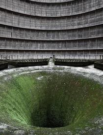 Defunct cooling tower in decommissioned power station Belgium