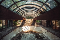 Deteriorating Indoor pool at a forgotten mountain Resort 
