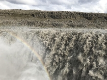Dettifoss Iceland the most powerful waterfall in Europe the mist causing an almost permanent hazy rainbow 