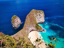 Doesnt the cliff looks like a giant thirsty dinosaur drinking water  Picture taken from Nusa penida island indonesia 