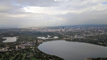 Downtown Minneapolis behind Lake Calhoun with a bonus rainbow