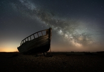 Dungeness fishing boat Astro photography  images stacked of the sky and a  minute long exposure for the foreground Stacked in starry landscape stacker and edited in photoshop and Lightroom