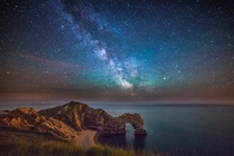 Durdle Door under the stars Dorset UK by Stephen Banks 