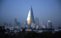 Dusk settles over Pyongyang North Korea as the -story Ryugyong Hotel towers over residential apartments Under construction for nearly  years later it has become a major Pyongyang landmark but has never been used as a hotel as it was intended Wong Maye-E 