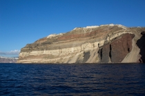 Each layer of color here indicates a different rock expelled by a different volcanic eruption that would eventually create the island we now know as Santorini Greece 