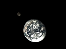 Earth with the moon in the background taken by Chinas Change -T 