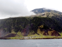 Edinburgh of the Seven Seas is the main settlement on the island of Tristan da Cunha an overseas territory of the UK in the South Atlantic Ocean It is regarded as the most remote permanent settlement on Earth being km from the nearest human settlement on 