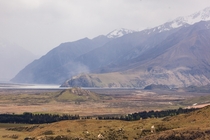 Edoras in the movie Mt Sunday Canterbury NZ in comparison to the mountains surrounding it 