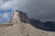 El Capitan emerging from clouds in crazy winds Guadalupe Mountains NP Texas 