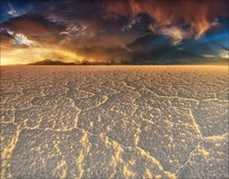 Emerging storm clouds over Salar de Uyuni the worlds largest salt flat  sq km sq mi Bolivia 