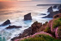 Evening light bathing the cornwall coastline in pastel colors 