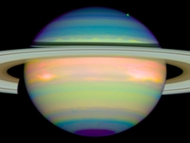 False-color image of Saturn shows the planets reflected infrared light The blue colors indicate a clear atmosphere down to a main cloud layer Different shadings of blue indicate variations in the cloud particles in size or chemical composition Erich Karko