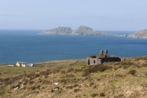 Farm House with Puffin Island in the background co Kerry Ireland 