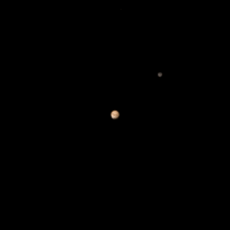 First colour movie of Pluto and Charon taken by New Horizons 