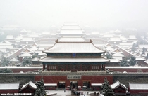 First snow in Beijing looking over the Forbidden City 