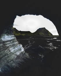 Floating inside a giant Ice Cave cut through a glacier in Iceland 