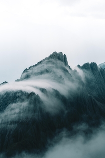 Flowing clouds at the Fleischbank in the Karwendel mountains  Austria  Feel free to check out my IG nicolas__myr for more