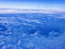 Flying Over the Alps at Sunset Yesterday somewhere around Switzerland on the way to Austria 