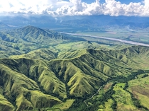 Flying over the Markham Valley Papua New Guinea via rotary wing in support of US DoD agency DPAA Pretty near