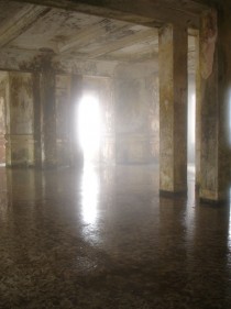 Fog spills into the casino hall in the abandoned French hotel on Bokor hill station Cambodia 