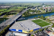 Football pitches and clubhouse on an IKEA parking garage Utrecht the Netherlands