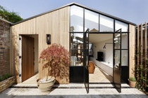 Former timber shed turned into a two-bedroom house clad in Western Red Cedar London UK by De Rosee Sa Photo Alex James 