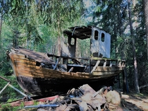 Found this gem during a hike - imagine driving a boat so far in the woods x Telemark Norway