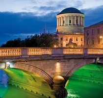 Four Courts and bridge over the River Liffey Dublin Image - Sean Caffrey