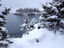 Fresh snow on Ellingson Island Split Rock Lighthouse State Park on Lake Superior MN 