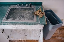 Frozen Sink Water left running in an abandoned health center 