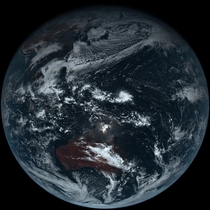 Full disk true-color image of Earth taken by Himawari- the Japanese weather satellite launched in October 