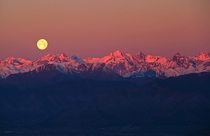 Full moon over the Alps near Turin Italy  by Stefano De Rosa 