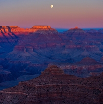 Full moon rising above the cliffs on Feb   in Grand Canyon AZ 