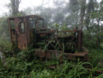 Gasoline-powered Kato Works locomotive left behind in the woods