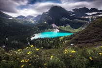 Glacial colored lake in the Summer at Grinnell Lake Glacier National Park 