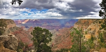 Grand Canyon  OC - rain falling on the Grand Canyon south rim view Amazing place Please make sure you visit it at least once in your lifetime