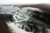 Gulfoss waterfall in Southern Iceland The river falls into a deep narrow canyon and seemingly disappears 