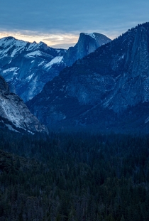 Half Dome on a freezing blue winter morning Yosemite National Park 